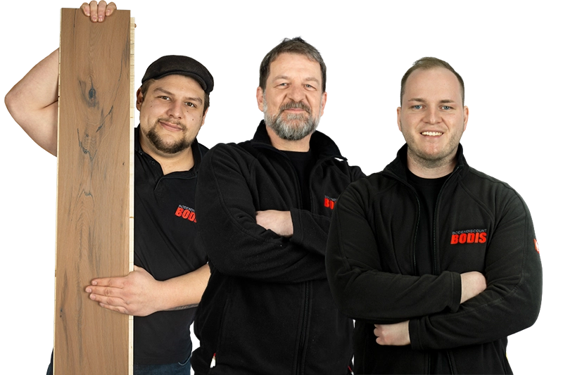 Die drei BODIS Fachverkäufer Patrick, Horst und Jan stehen nebeneinander und lächeln.