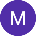 M C