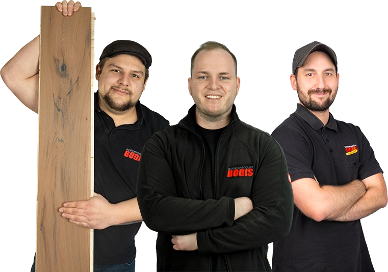 Die drei BODIS Fachverkäufer Patrick, Jan und Marcel stehen nebeneinander und lächeln.